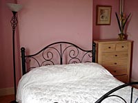 One of
                the bedrooms of Crescent House